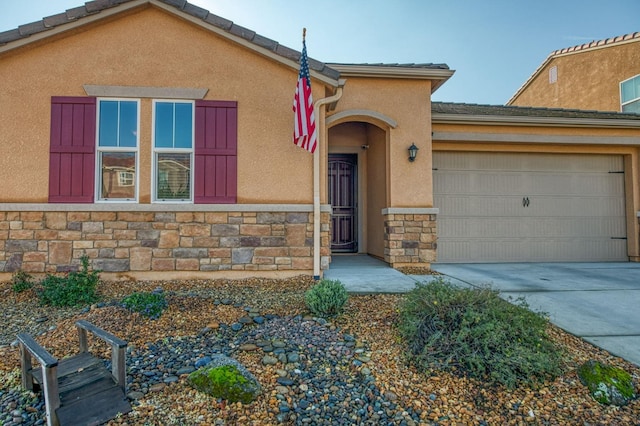 view of front of home with a garage