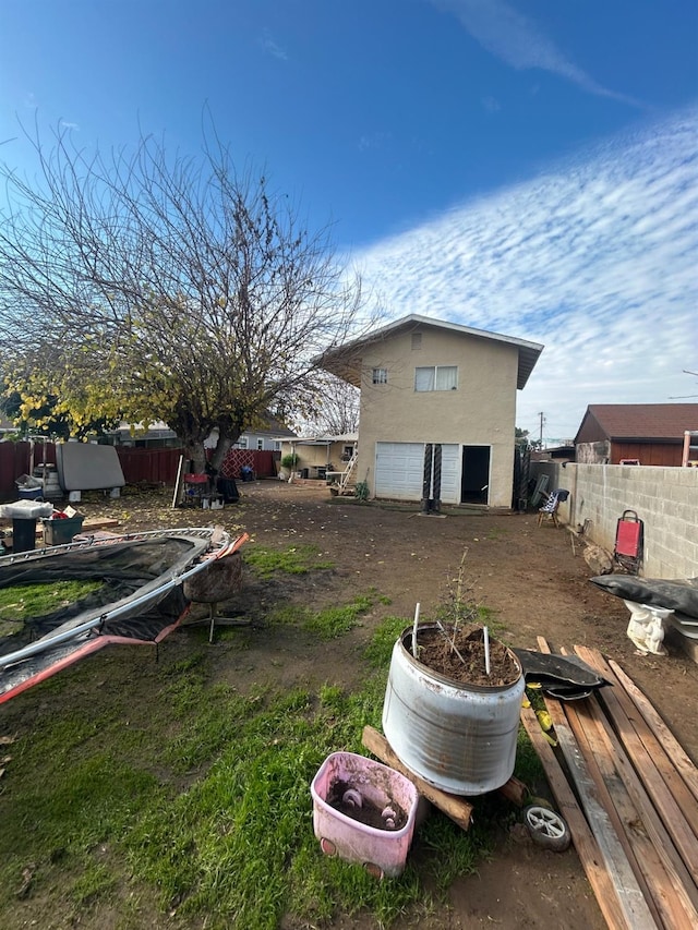 view of yard with a garage