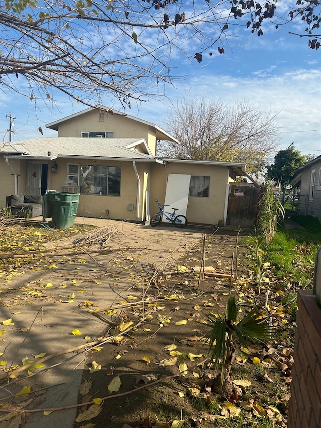 rear view of house with a patio area