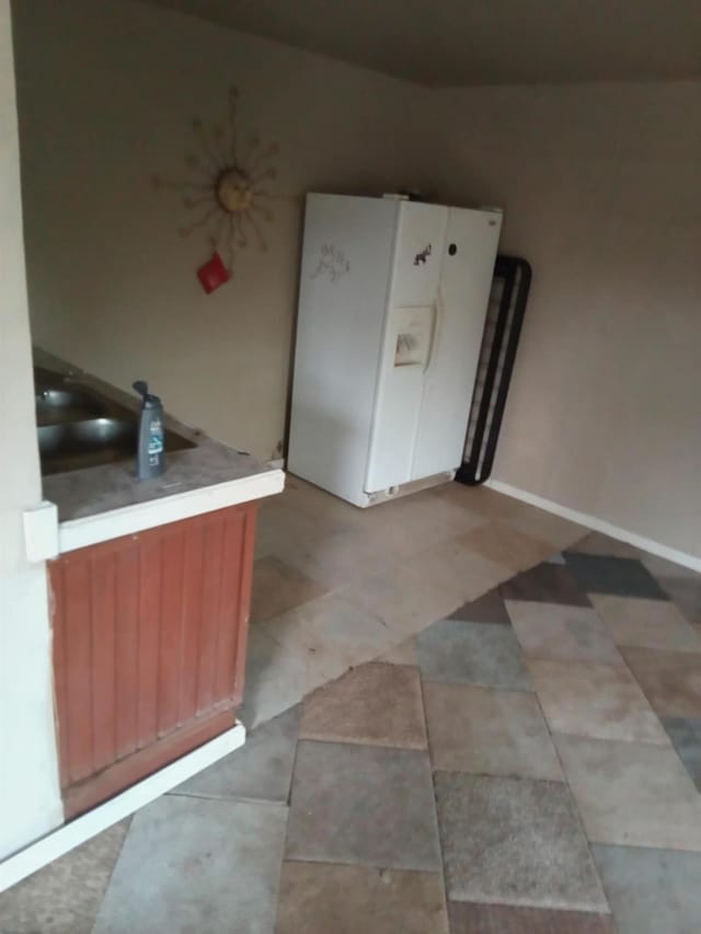kitchen featuring white refrigerator