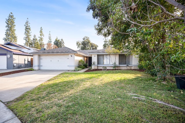 single story home featuring a garage and a front lawn