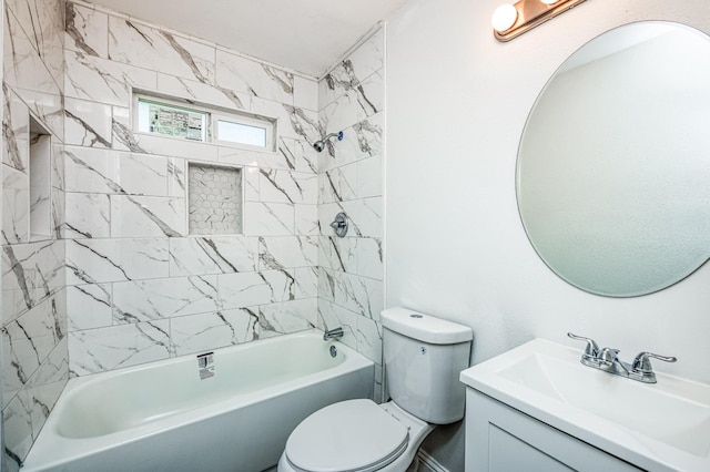 full bathroom with vanity, toilet, and tiled shower / bath combo