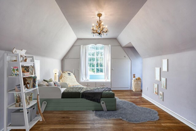 3628 N Van Ness, Fresno, CA 93704 - bedroom with wood finished floors, lofted ceiling, and a chandelier
