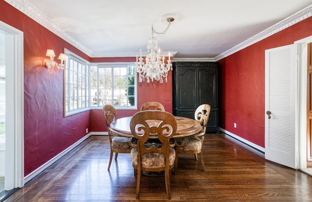 dining space featuring dark wood-type flooring, crown molding, and a notable chandelier