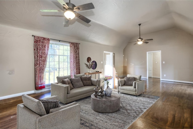 living room featuring dark hardwood / wood-style flooring, ceiling fan, and lofted ceiling