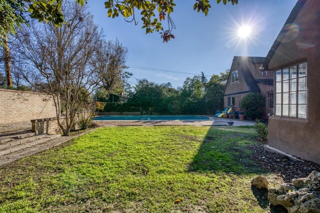 3628 N Van Ness, Fresno, CA 93704 - view of green lawn featuring a patio area