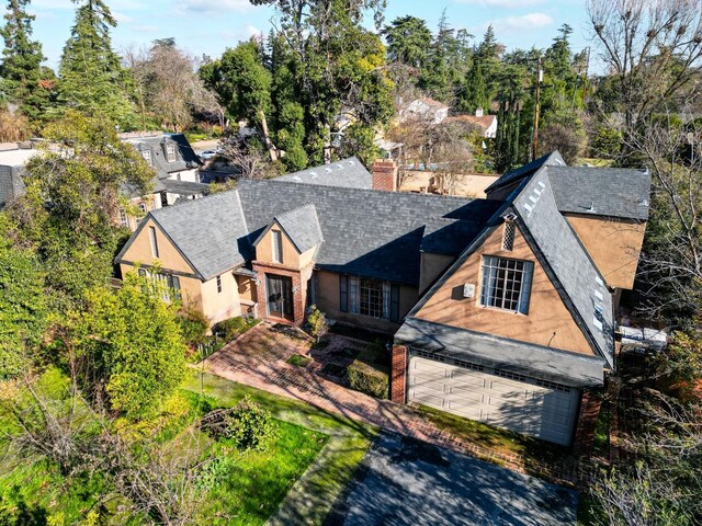 3628 N Van Ness, Fresno, CA 93704 - view of front of property with a garage, a chimney, asphalt driveway, and roof with shingles