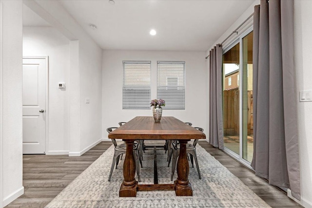 dining room featuring dark wood-type flooring