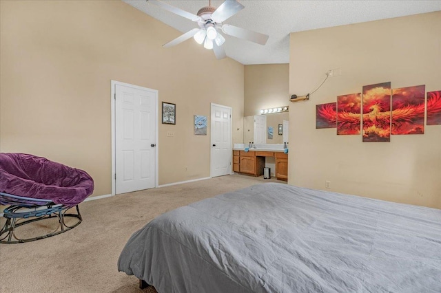 carpeted bedroom featuring connected bathroom, ceiling fan, high vaulted ceiling, and a textured ceiling