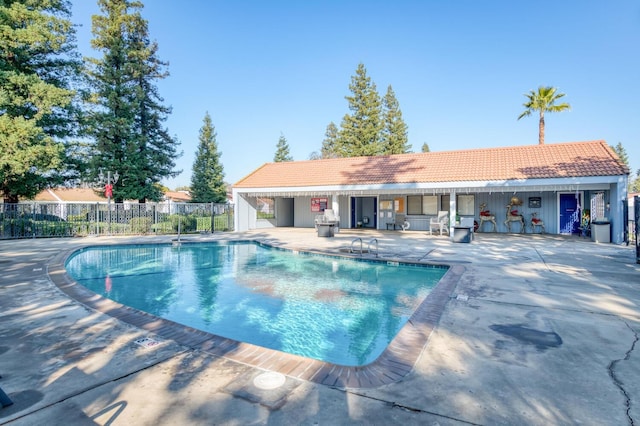 view of pool featuring a patio