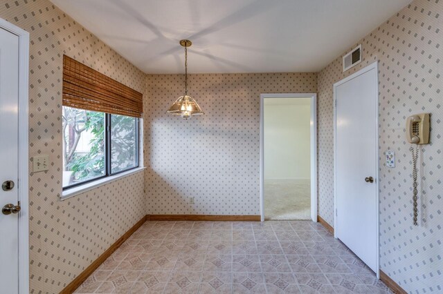 view of unfurnished dining area