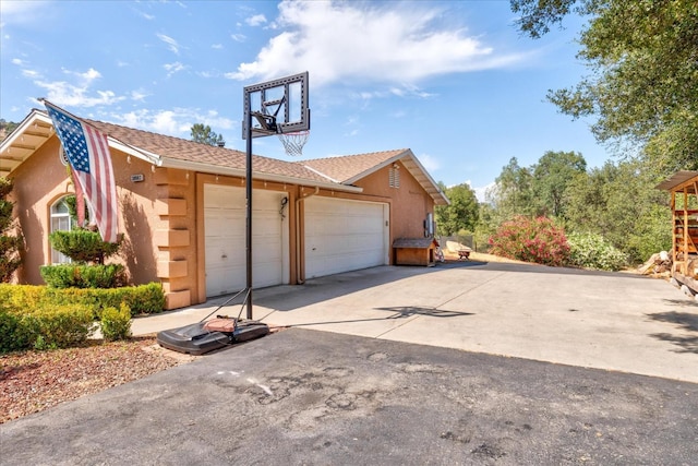 view of property exterior with a garage