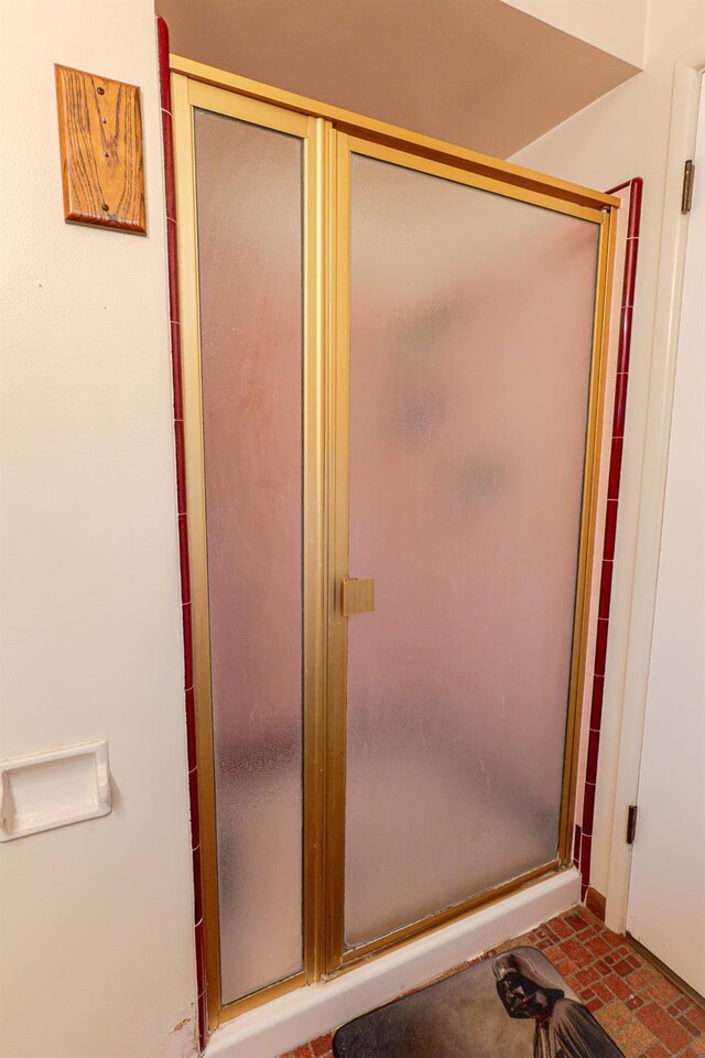 bathroom featuring walk in shower