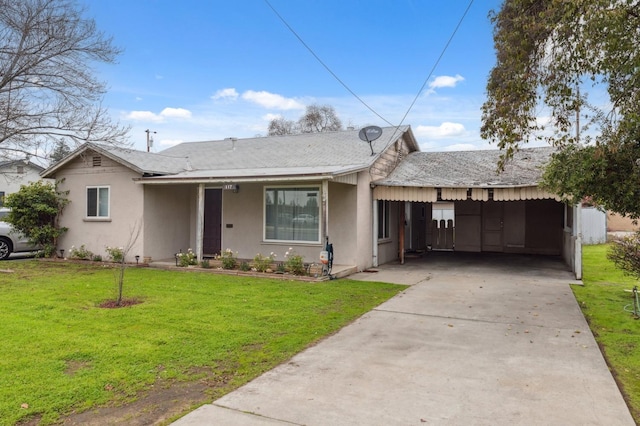 single story home with a front yard and a carport