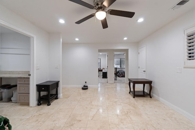 interior space featuring baseboards, visible vents, and recessed lighting