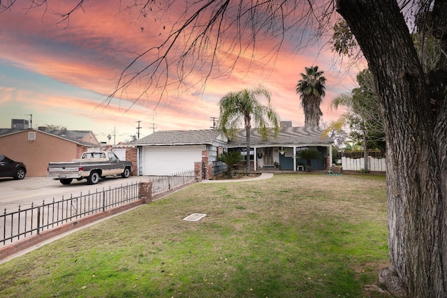 ranch-style house with a lawn