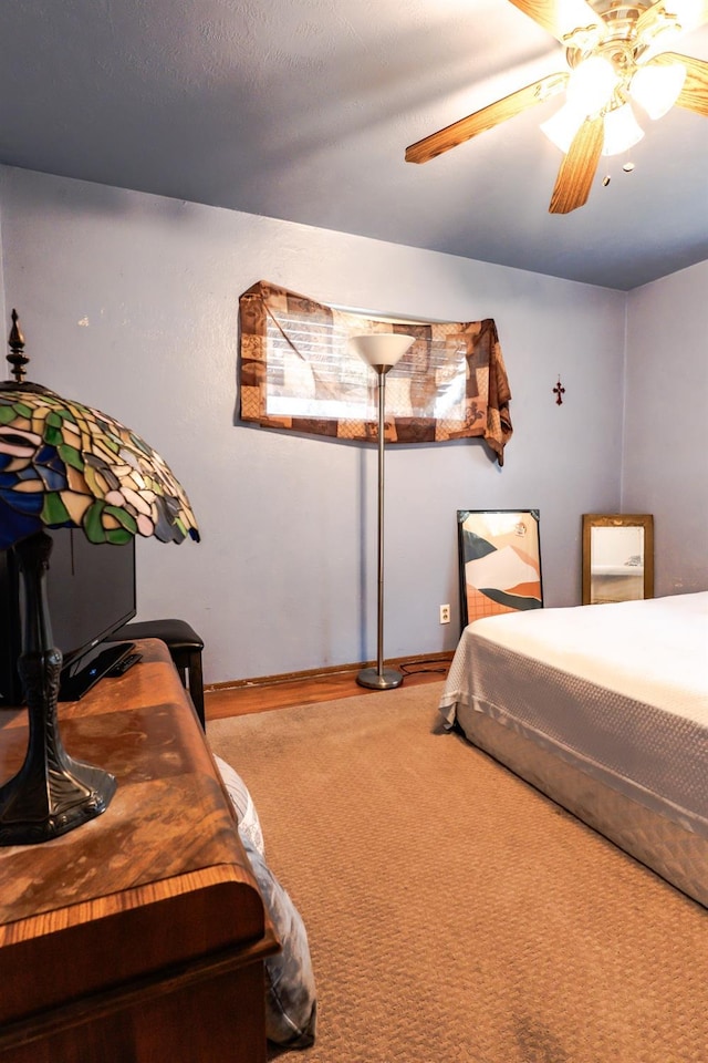 bedroom featuring carpet flooring and ceiling fan