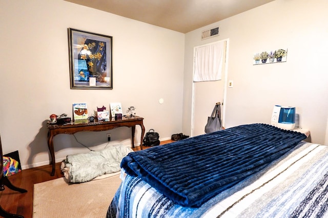 bedroom featuring hardwood / wood-style floors