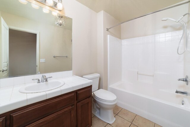 full bathroom with tile patterned floors, vanity, toilet, and shower / bathing tub combination