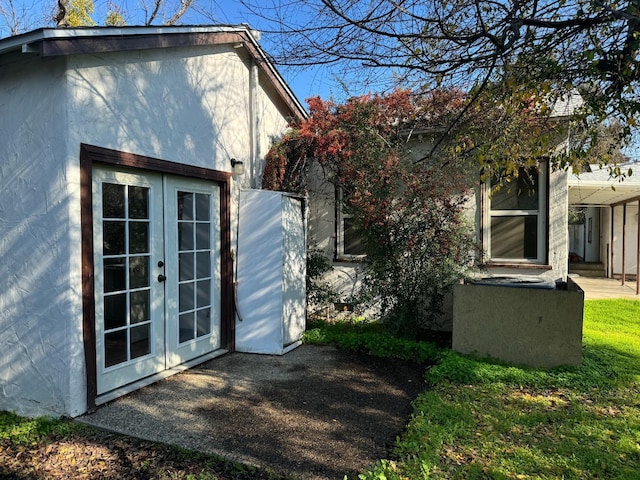 view of home's exterior with french doors