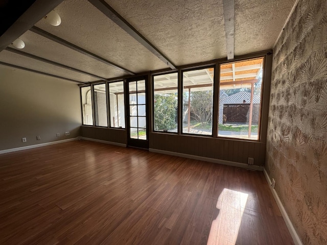 empty room featuring dark hardwood / wood-style floors