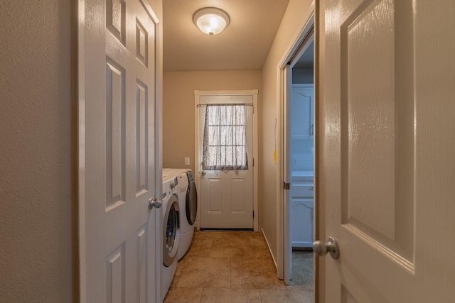 laundry area featuring laundry area and separate washer and dryer