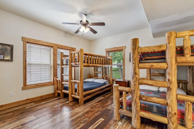 bedroom featuring dark hardwood / wood-style floors and ceiling fan