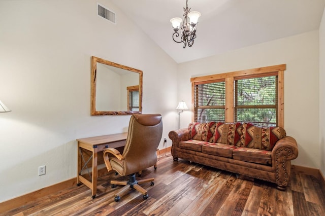 office space with dark hardwood / wood-style flooring, vaulted ceiling, and an inviting chandelier