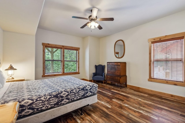 bedroom featuring dark hardwood / wood-style floors and ceiling fan