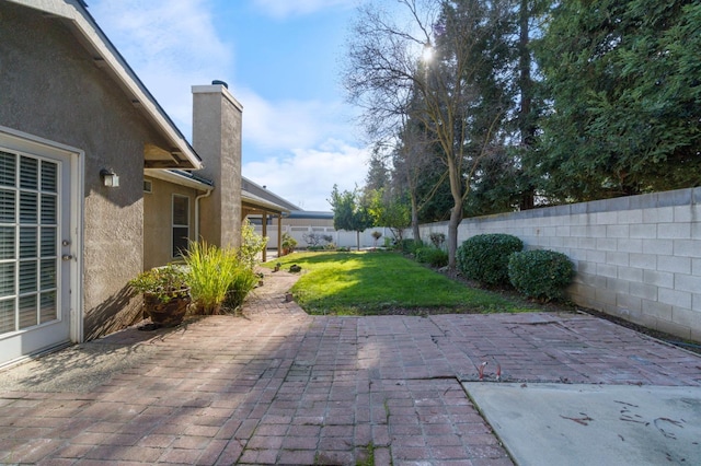 view of patio with a fenced backyard