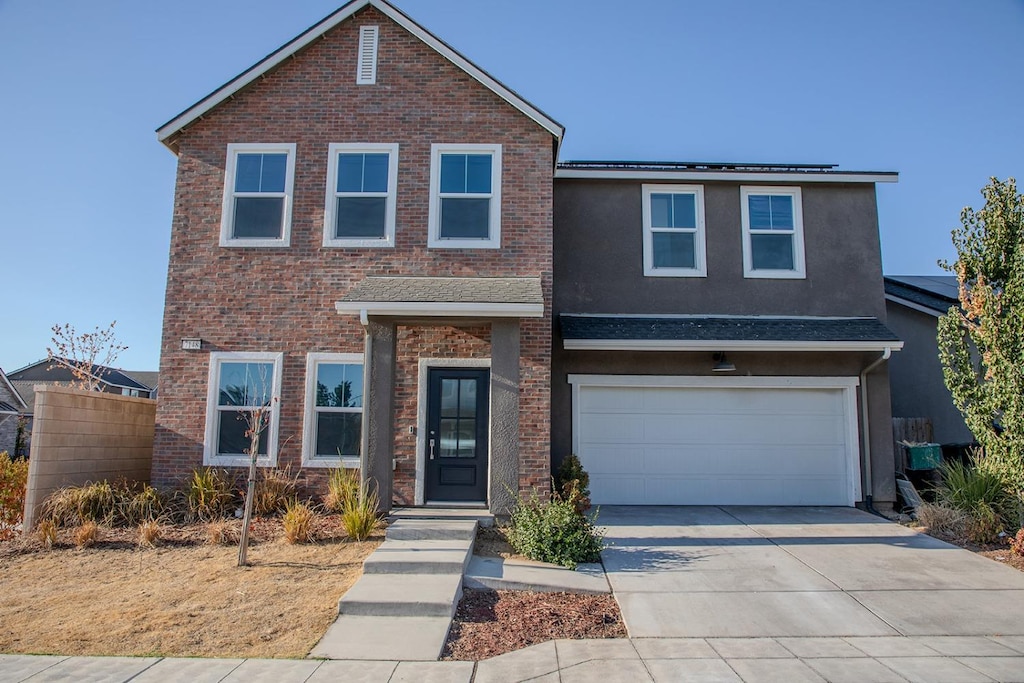 view of front of home featuring a garage