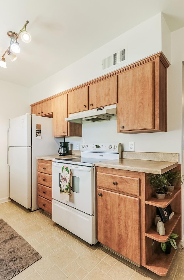 kitchen featuring white appliances