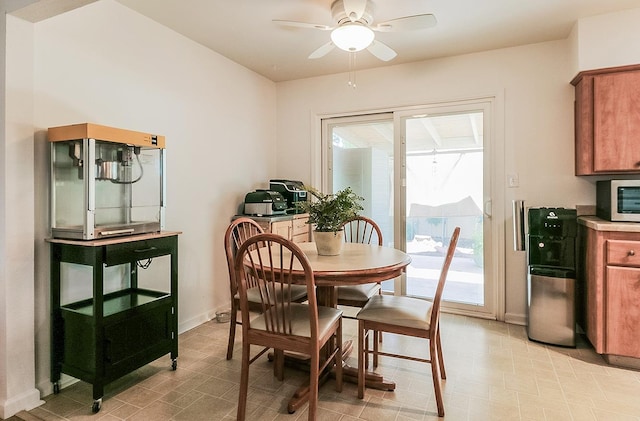 dining space with ceiling fan