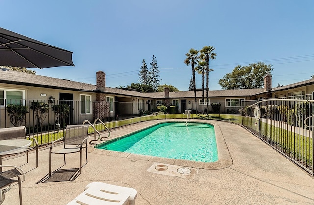 view of pool featuring a patio area