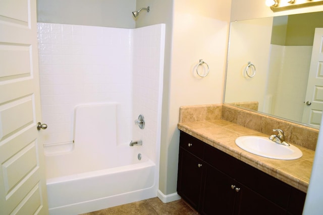 bathroom featuring tile patterned floors, vanity, and bathtub / shower combination