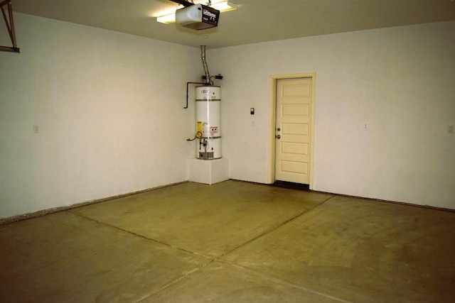 garage with secured water heater and a garage door opener