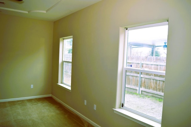 view of carpeted spare room