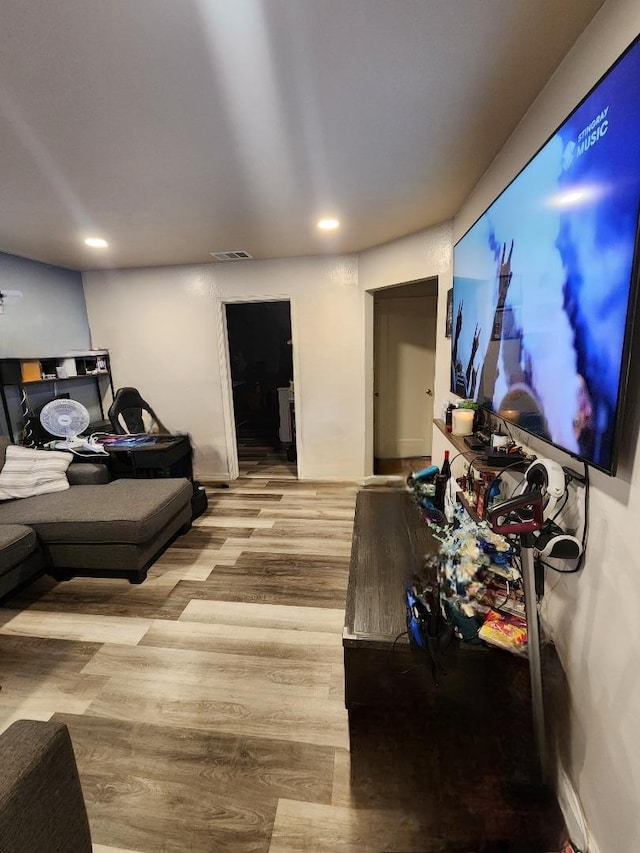 living room with light hardwood / wood-style floors