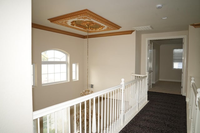 hall featuring ornamental molding