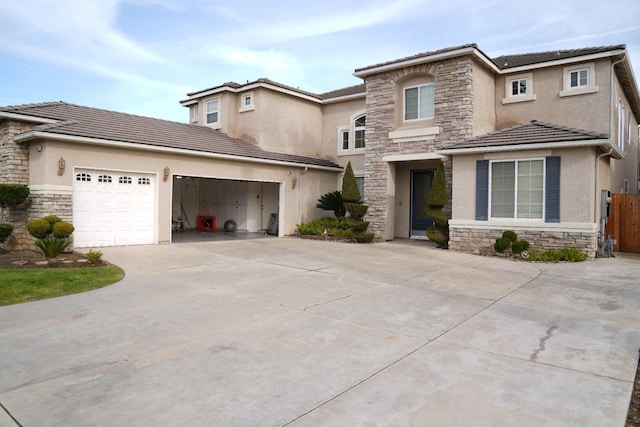 view of front of property featuring a garage