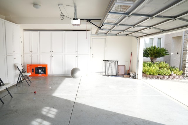 garage featuring a garage door opener