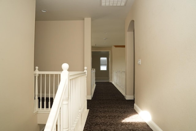 hall featuring carpet floors