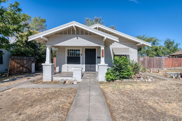 bungalow-style home featuring a porch