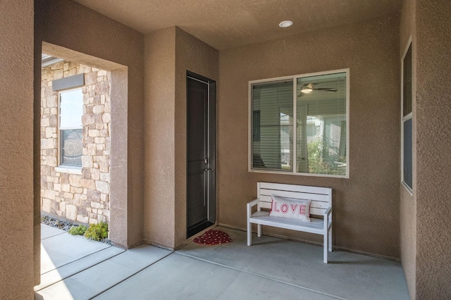 entrance to property with a patio area