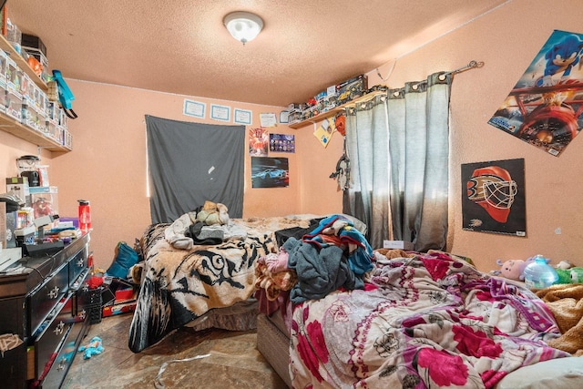 bedroom with a textured ceiling