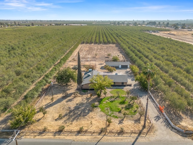 birds eye view of property with a rural view