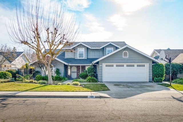 view of front facade featuring a garage and a front yard