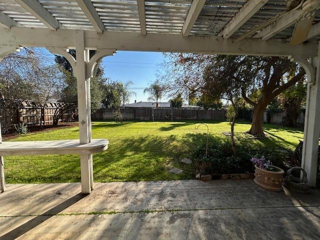 view of yard featuring a fenced backyard and a patio