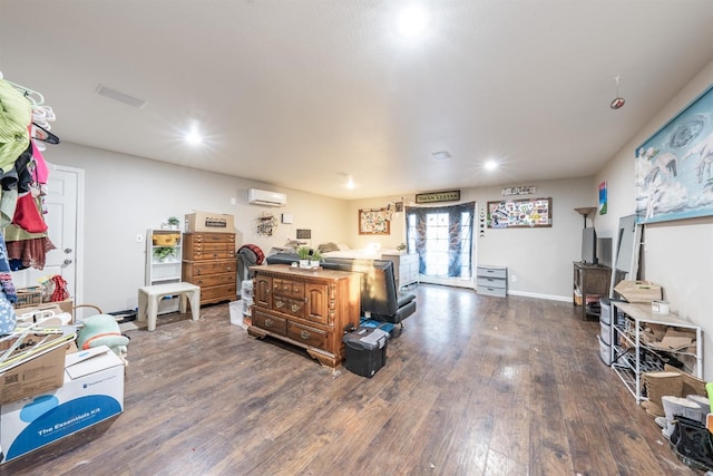 interior space featuring an AC wall unit and dark wood-type flooring