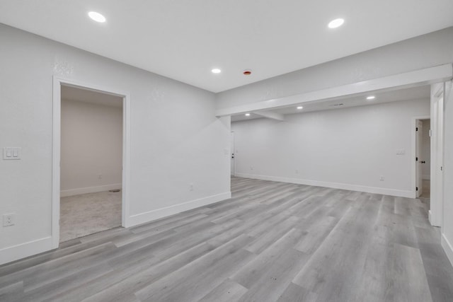 unfurnished room featuring light hardwood / wood-style floors